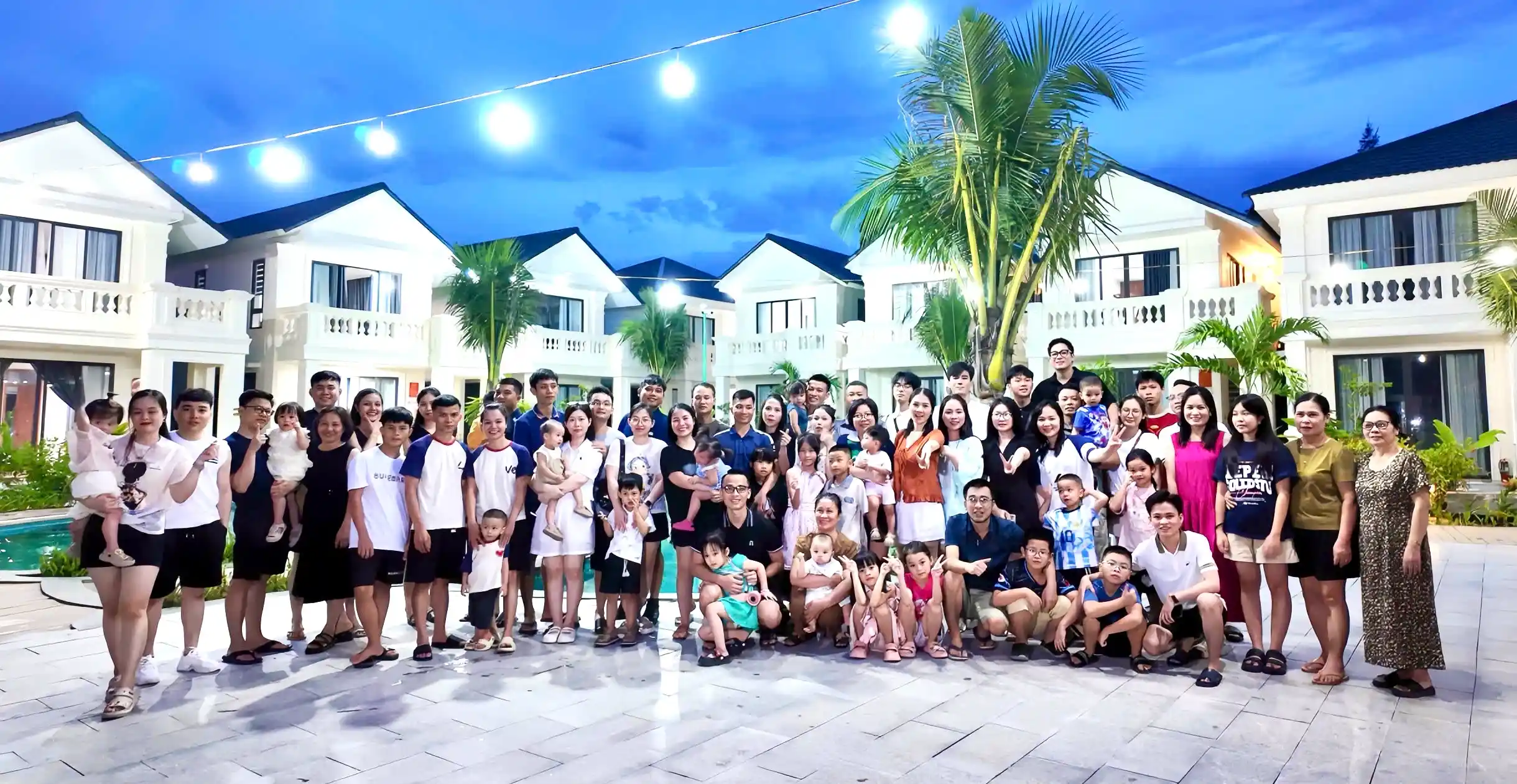Amber Trans team group photo at company retreat resort